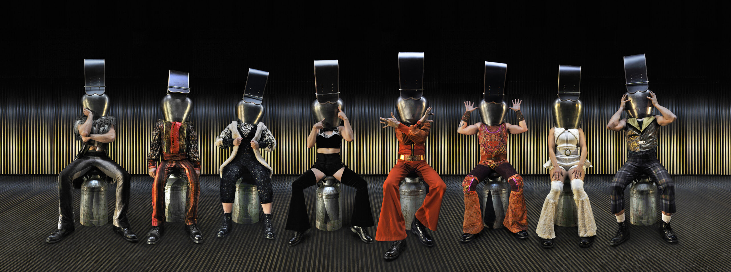 Animal Production Photo - cast with cowbell helmets