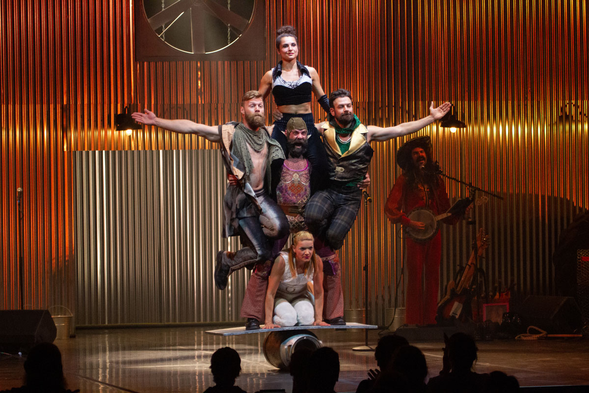 Animal Production Photo - Cast in an acrobatic pyramid